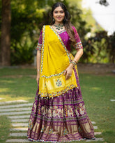 Purple Lehenga Choli With Mirror Work And Attached Yellow Dupatta