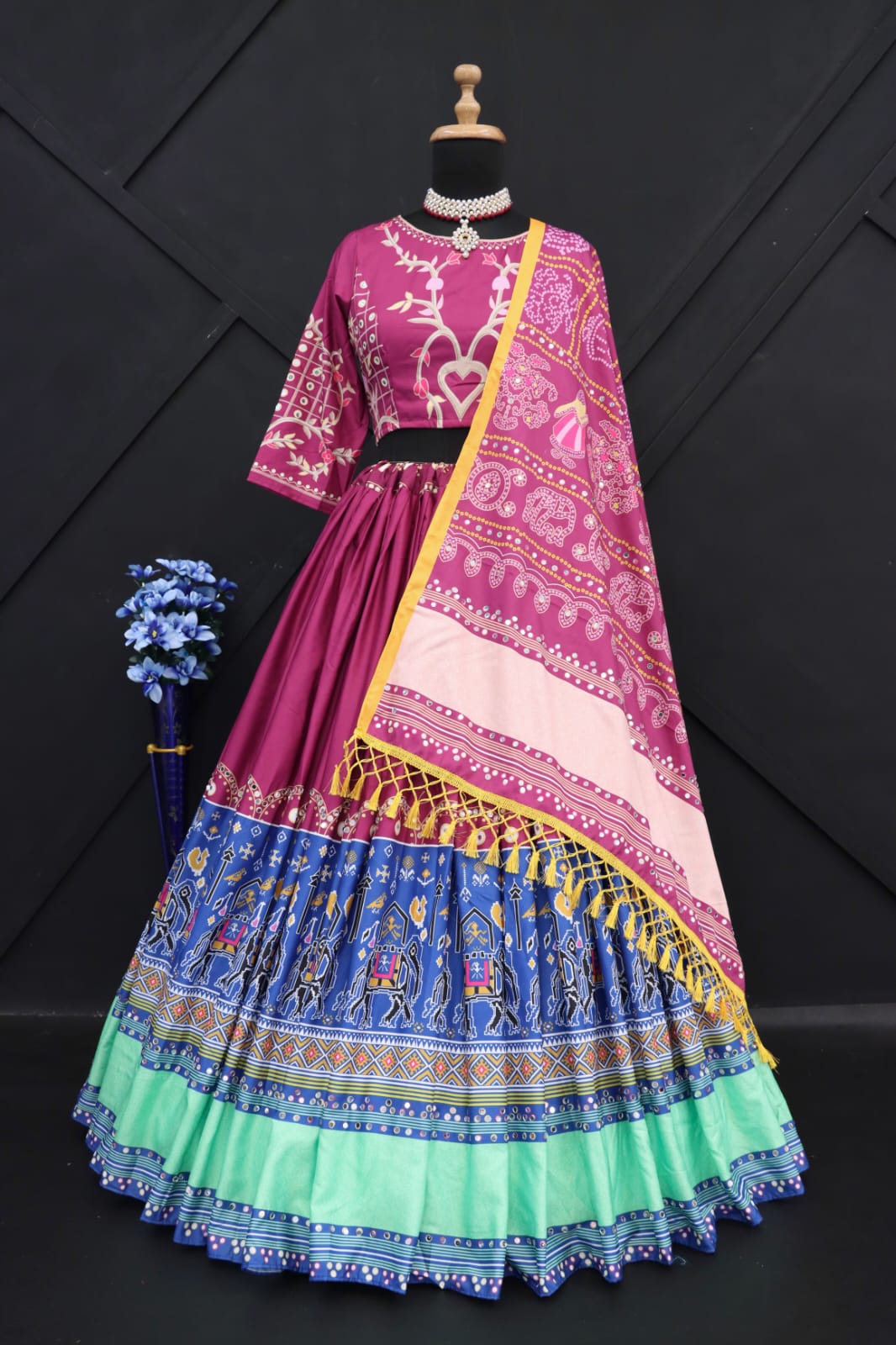 Purple Lehenga Choli With Mirror Work And Attached Purple Dupatta