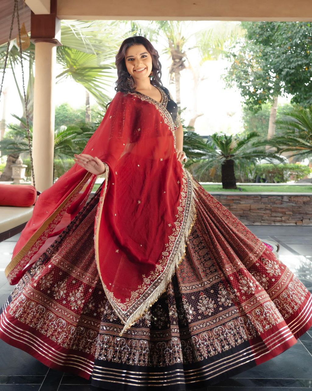 RED AJRAKH Lehenga Choli With Mirror Work And Attached Dupatta